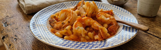 Gamba’s in tomatensaus met witte bonen