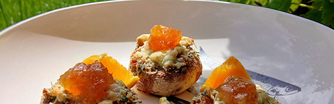 Gevulde champignons met spek, dragon en sinaasappelmarmelade