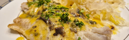 Roodbaars met zuurkool, appel & mosterdboter