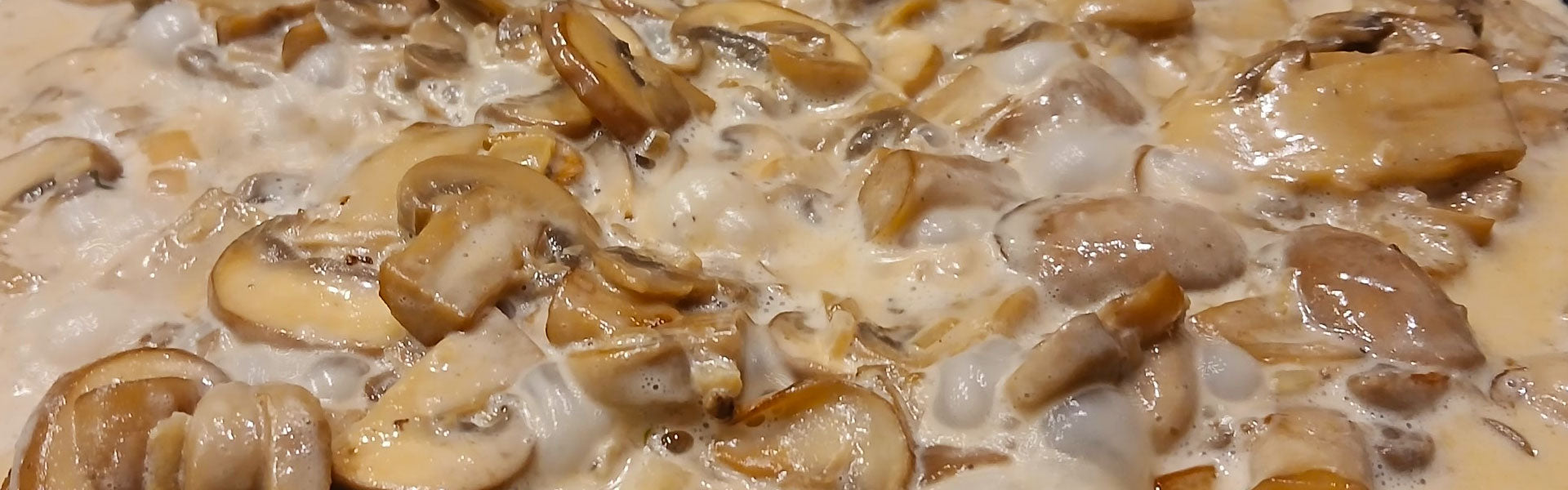 Champignons in roomsaus